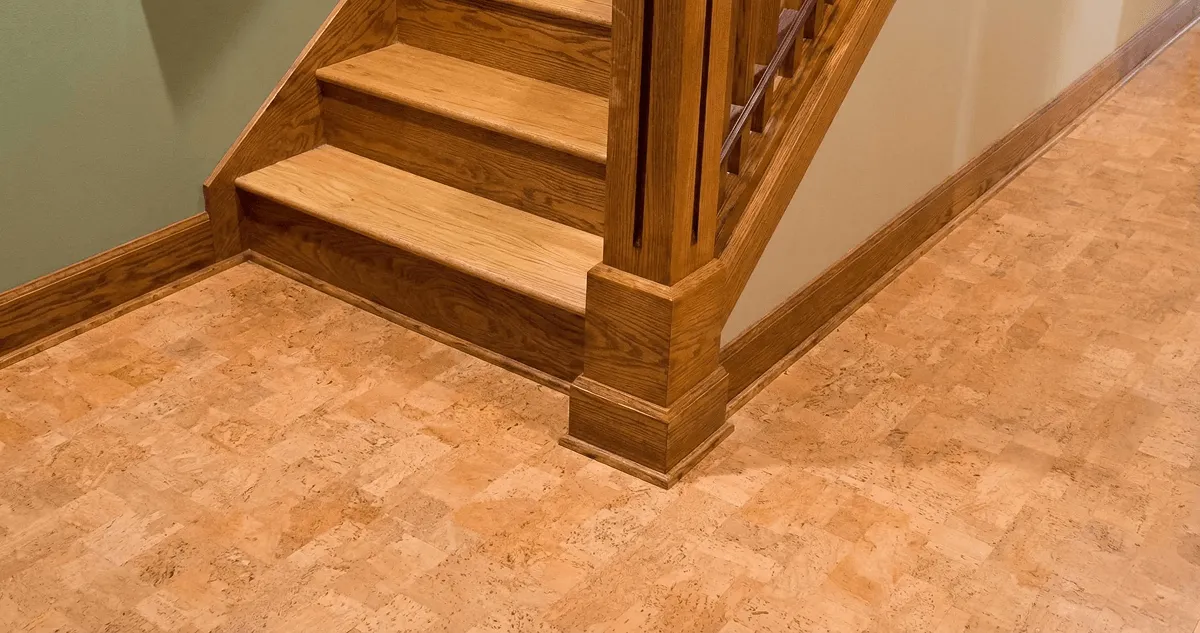 End of a staircase with cork flooring in Ann Arbor, MI